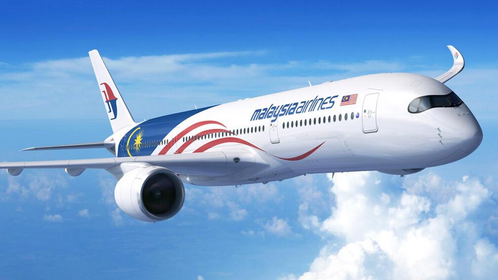 A Malaysia Airlines jet flying through clouds