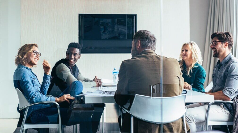 ServiceNow people are working in a modern office