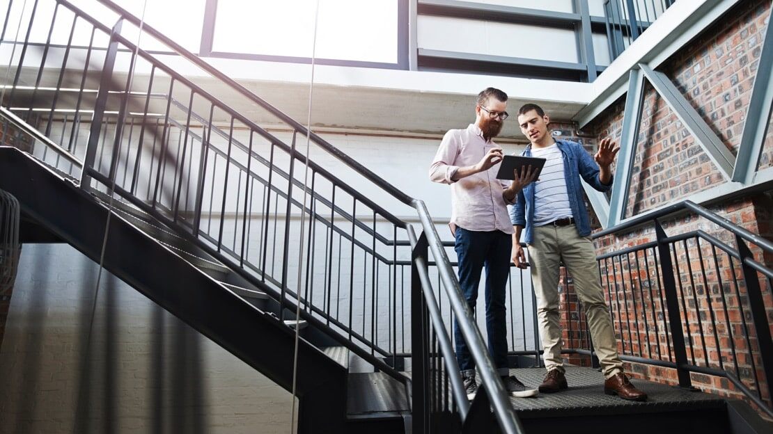 ServiceNow employees on stairs