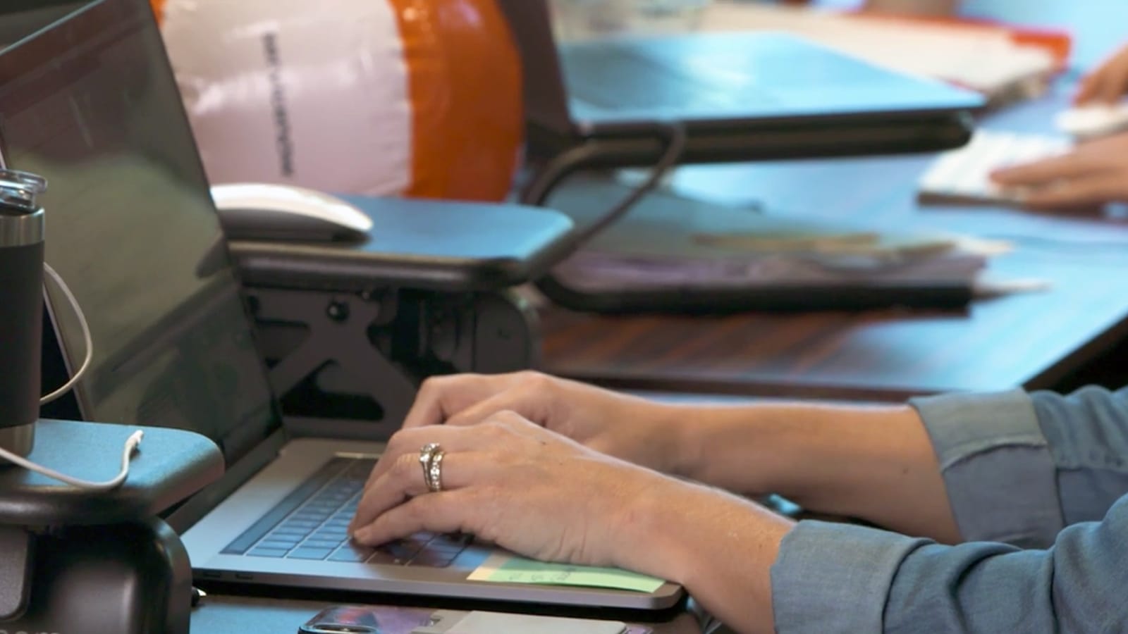 Two ServiceNow software engineers prepare for presentation
